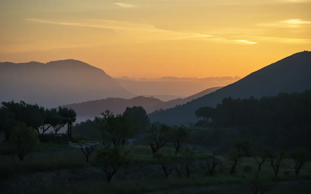 enjoy the sunset from the terrace of our small boutique hotel