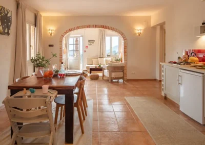 Taronger toddler friendly suite has a kitchen, large dining area and sunny lounge area which opens onto the terrace with panoramic views over the valley towards the mediterranean coast