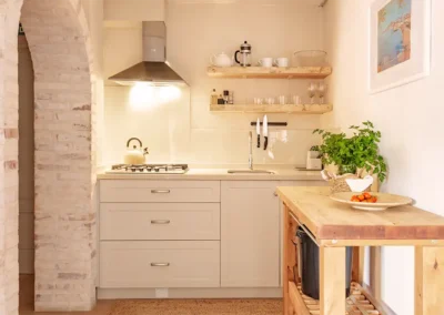 Palmera 2 bedroom family apartment has a well equipped ktichenette. There is fresh parsley and tomatoes from our kitchen garden.